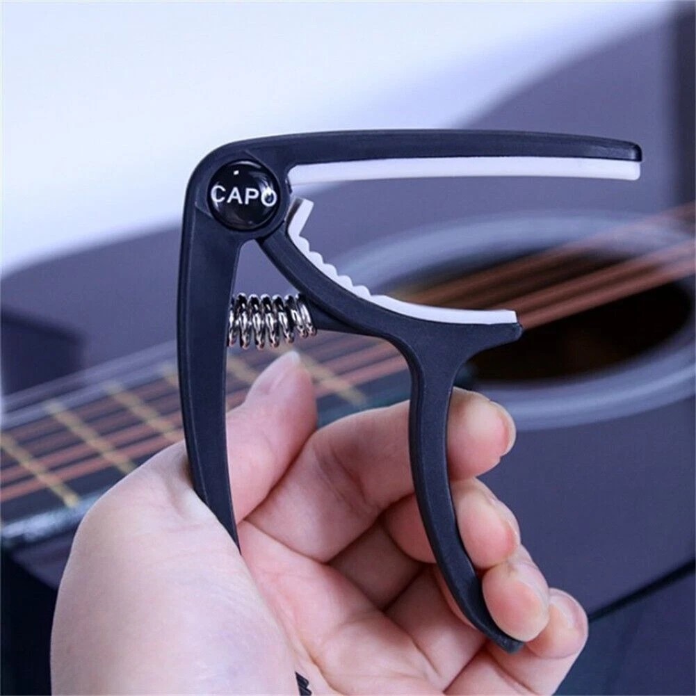 Универсальный гитарный каподас – обзор и цена Guitar Capo Clip