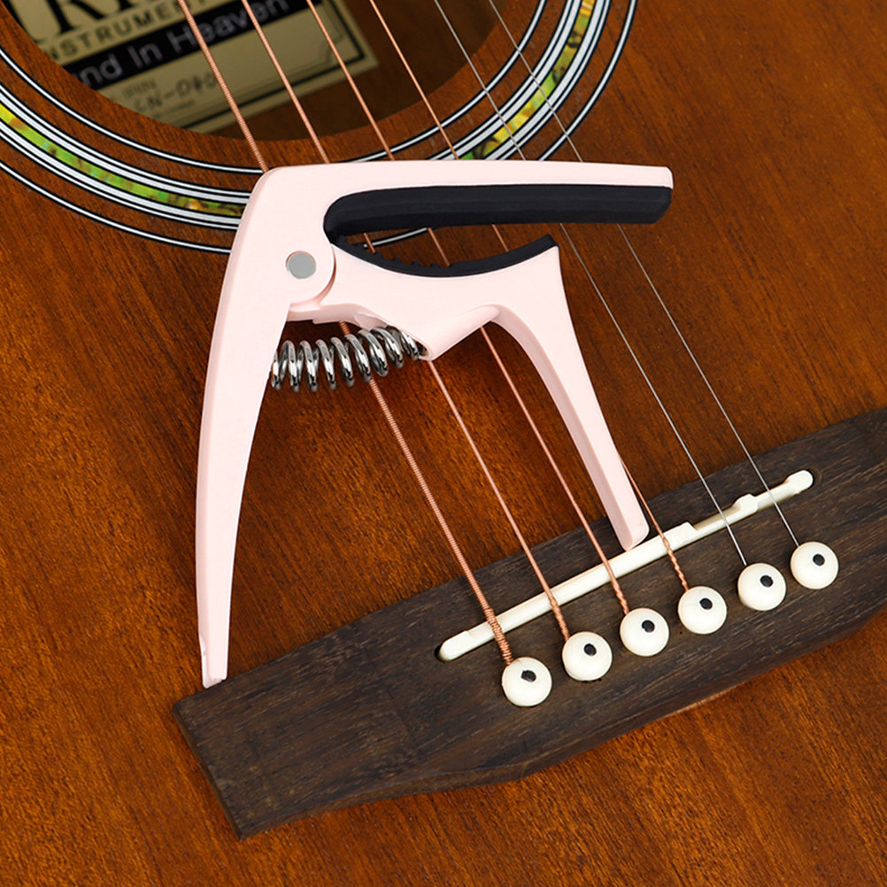 Универсальный тюнер-капо для г – обзор и цена Guitar Capo Clip