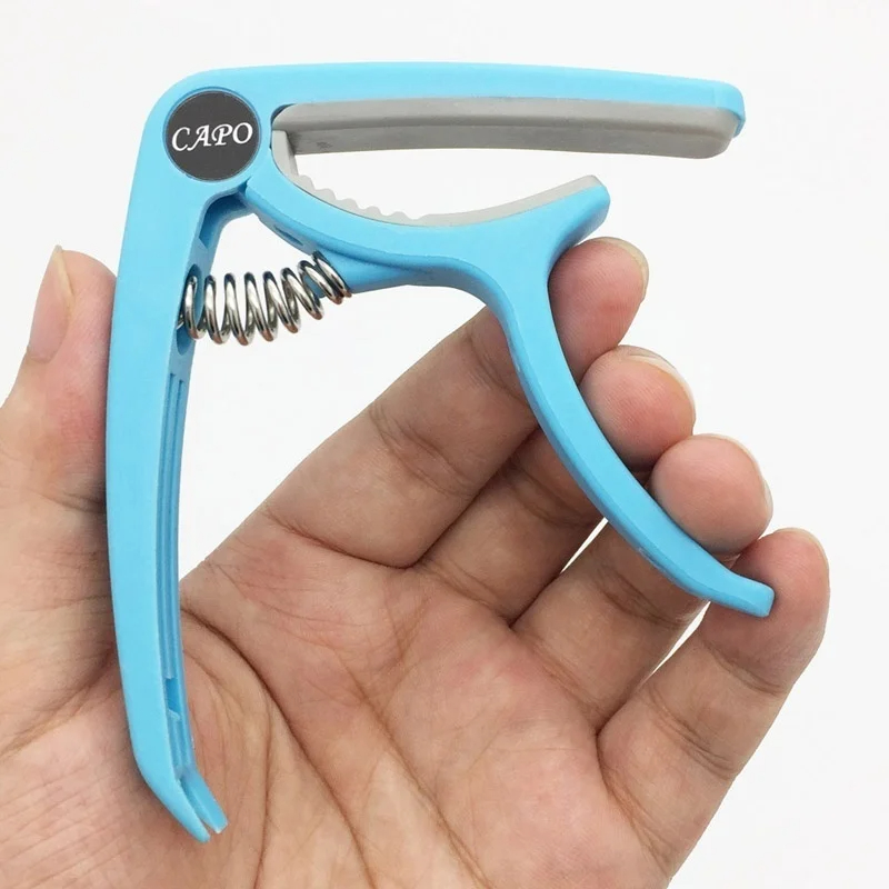 Пластиковый каподастр для 6-ст – обзор и цена Guitar Capo Clip